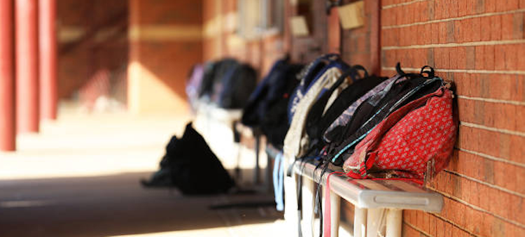 picture of backpacks on bench