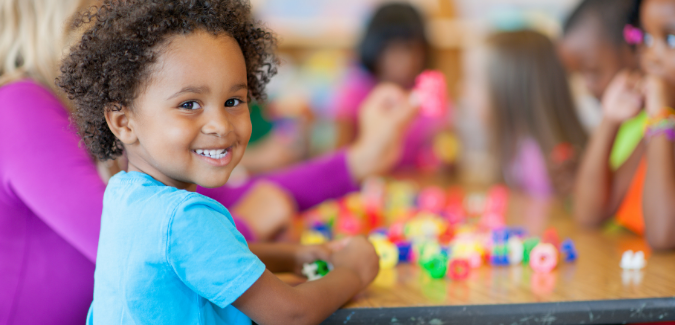 Kindergarten student at desk