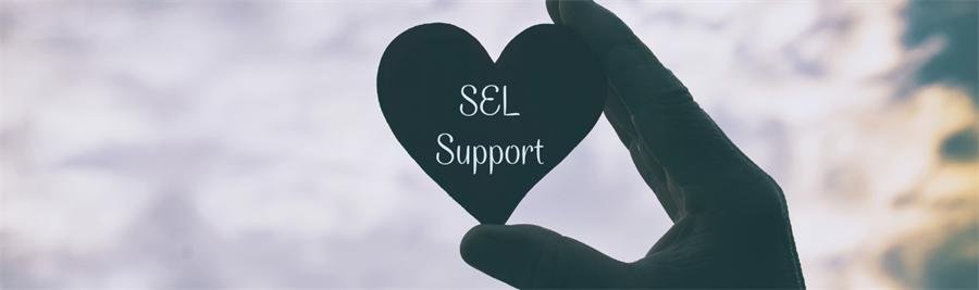 Silhouette photo of a hand holding a heart with text--SEL Support Silhouette photo of a hand holding a heart with text--SEL Support