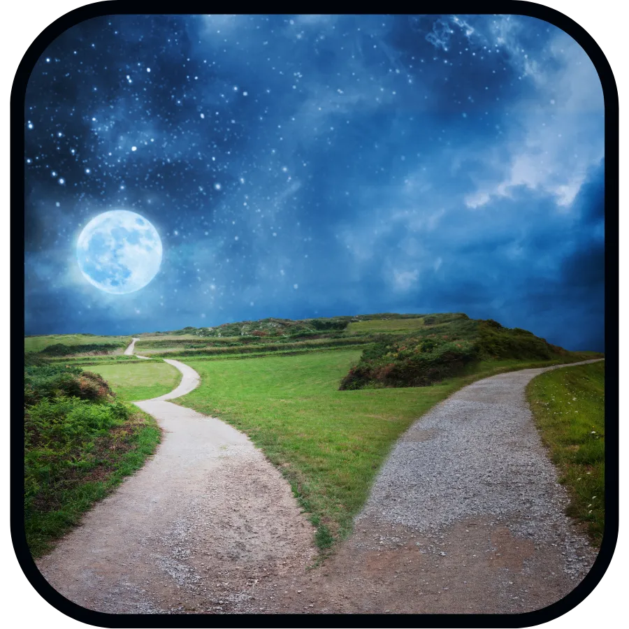 Two roads diverging with moon in background