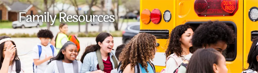 Family resources webpage banner with photo of students boarding a school bus