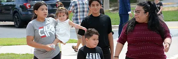 Family attending a community event at Kilby Elementary School